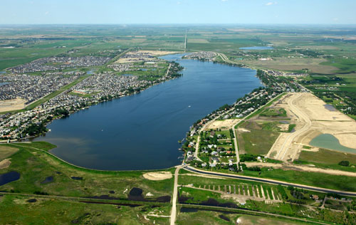 Chestermere Lake. Once heralded by CTV News as being the most polluted lake in Alberta. The smell of either SHIT or rotten eggs in the surrounding areas doesn't help.
