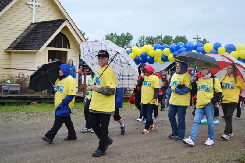 Photo by Carl BR Johnson -- Supporters were surrounded by rain, and hope, at Relay for Life.