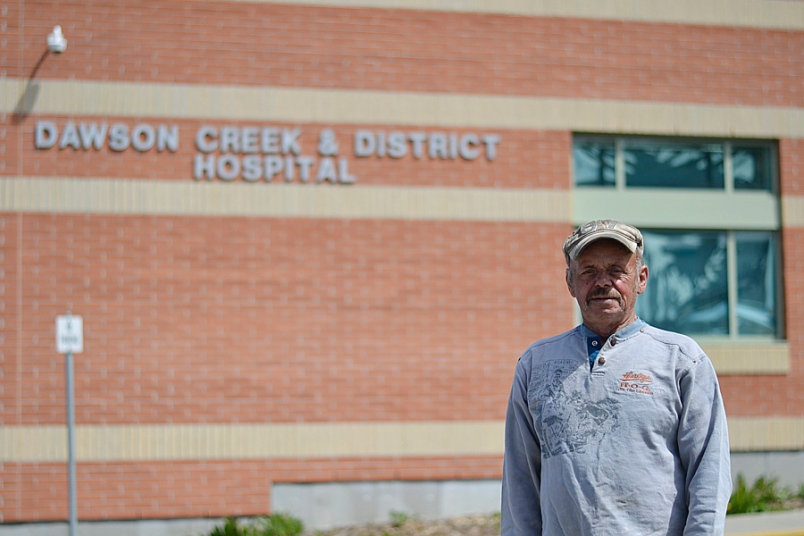 Photo by Carl BR Johnson -- John Cottam visits his brother in the Dawson Creek hospital.
